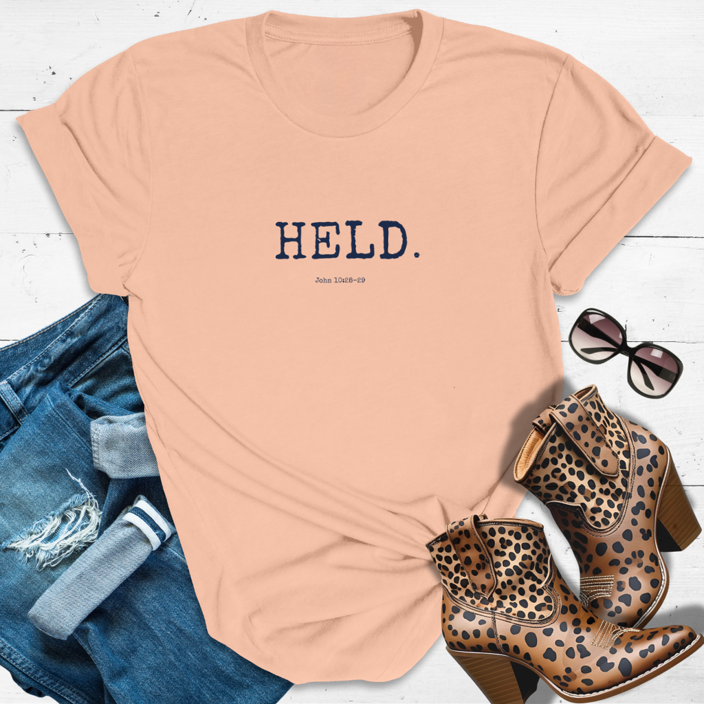 HELD.™ Tee – Safe in His Hands