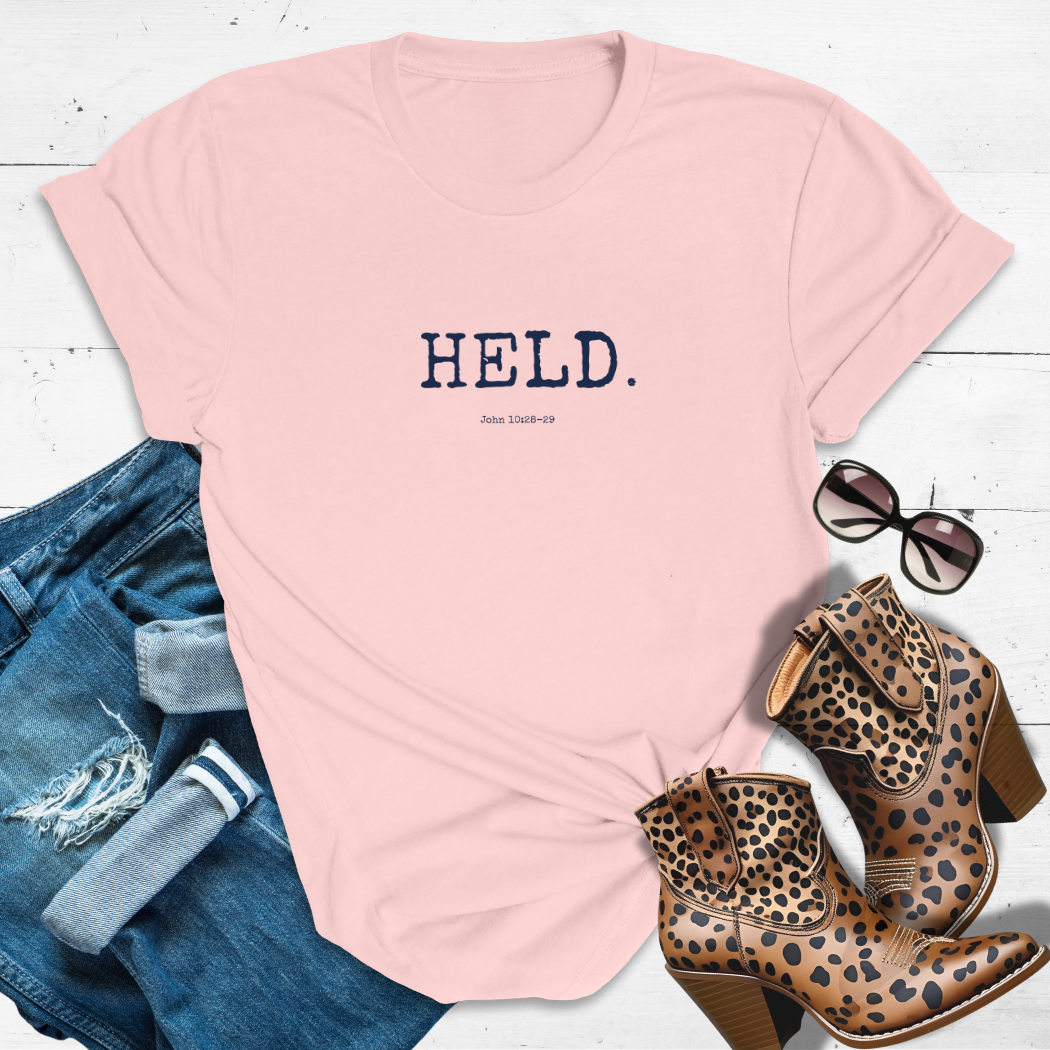 HELD.™ Tee – Safe in His Hands