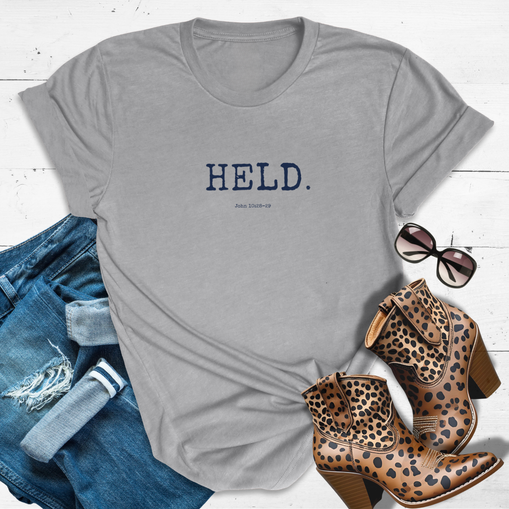 HELD.™ Tee – Safe in His Hands