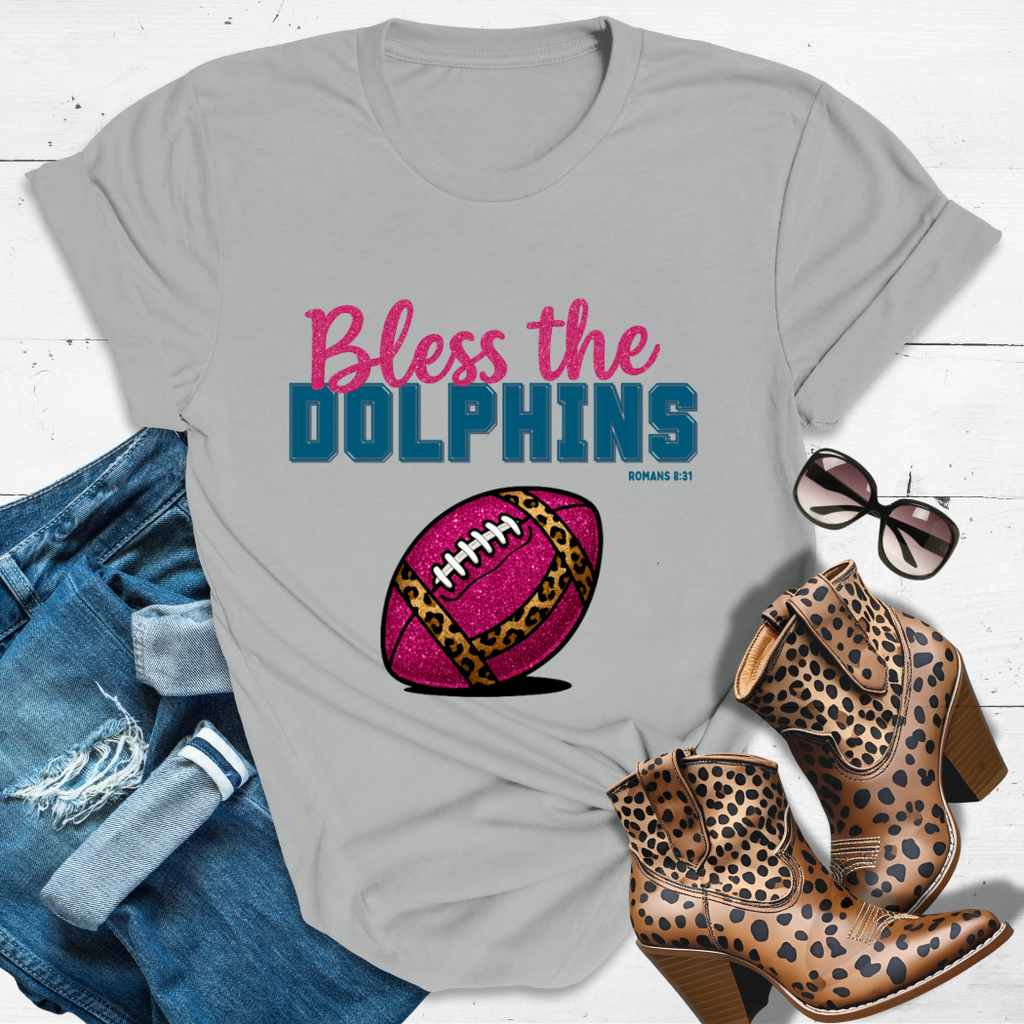 BLESS THE DOLPHINS™ — Heaven’s got favorites — and she’s loud in the stands.