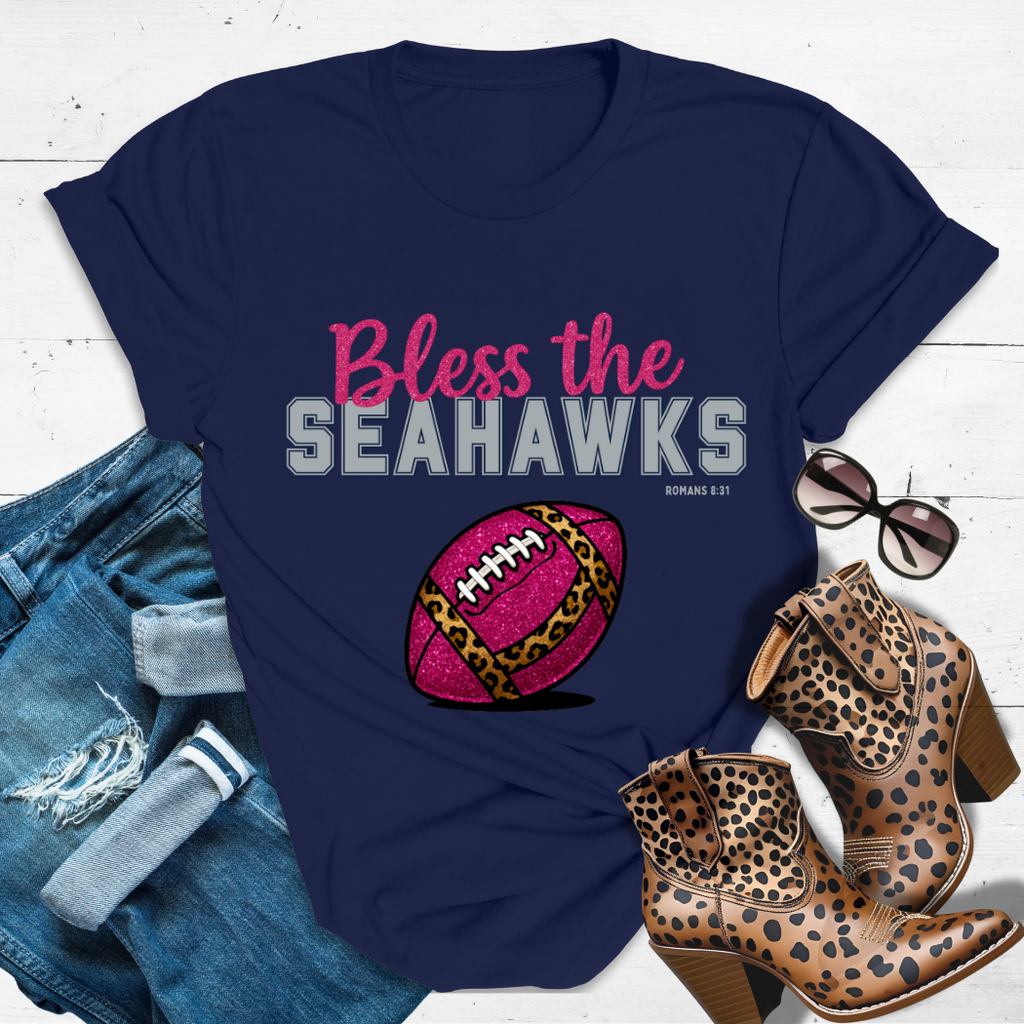 BLESS THE SEAHAWKS.™ Tee — Heaven’s got favorites — and she’s loud in the stands.