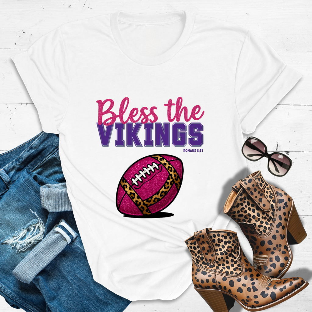 BLESS THE VIKINGS™ Tee — Heaven’s got favorites — and she’s loud in the stands.