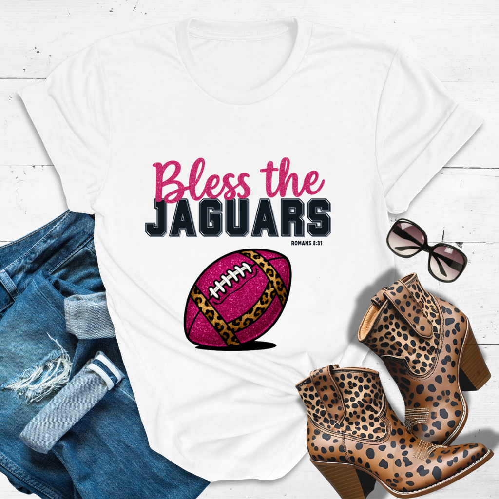 BLESS THE JAGUARS™ Tee — Heaven’s got favorites — and she’s loud in the stands.