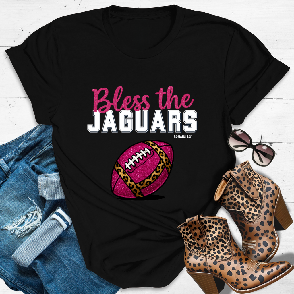 BLESS THE JAGUARS™ Tee — Heaven’s got favorites — and she’s loud in the stands.