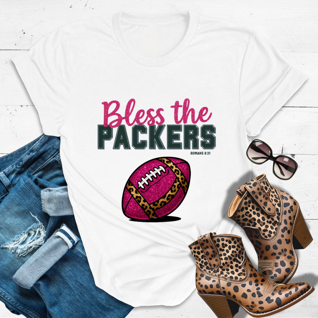 BLESS THE PACKERS™ Tee — Heaven’s got favorites — and she’s loud in the stands.