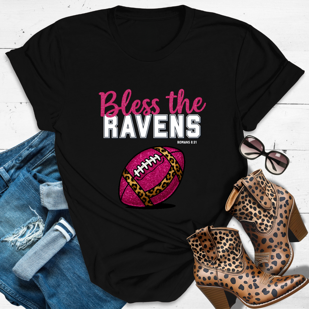 BLESS THE RAVENS™ Tee — Heaven’s got favorites — and she’s loud in the stands.