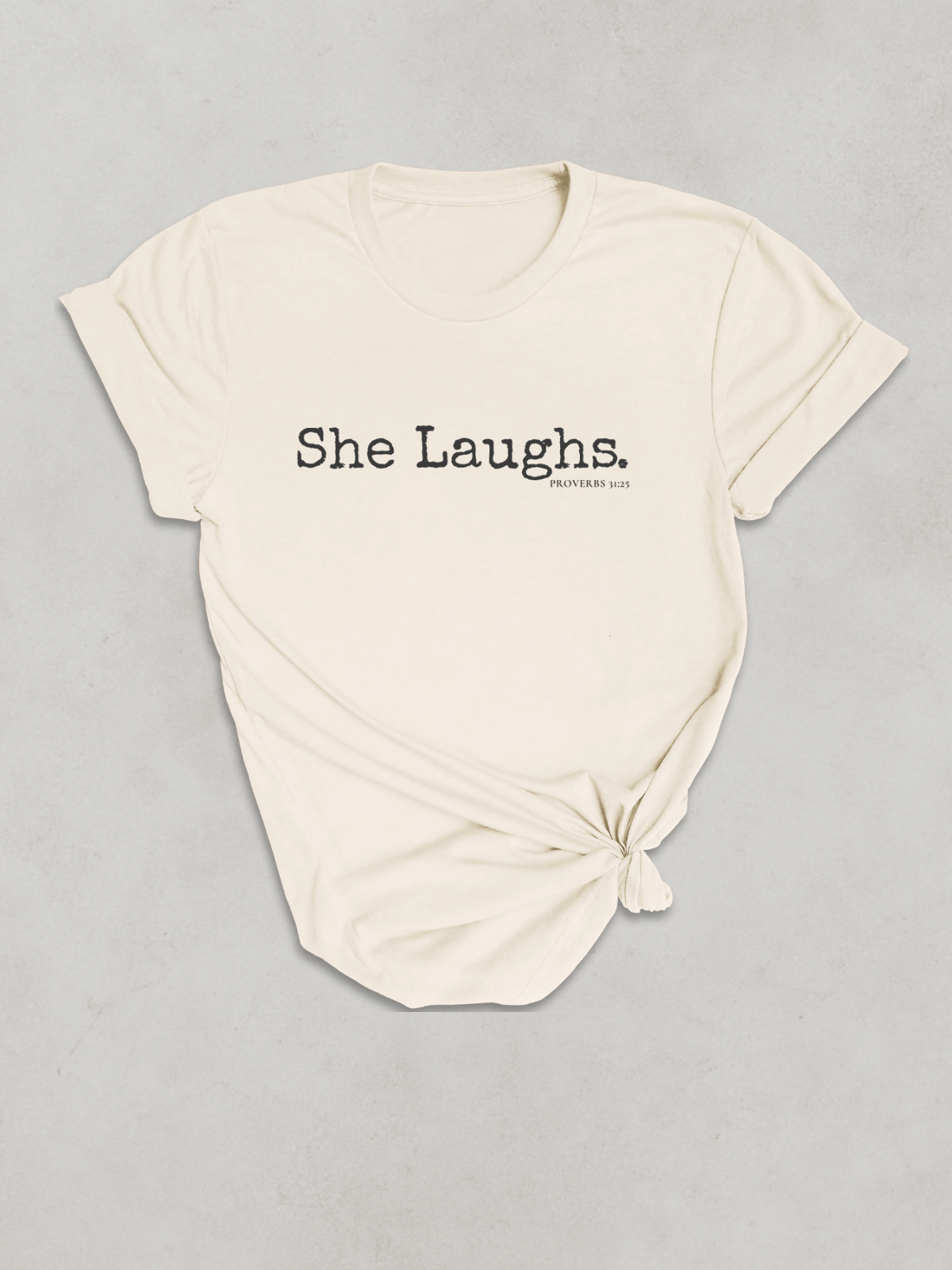 SHE LAUGHS.™  — Scripture-in-Motion™ Tee
