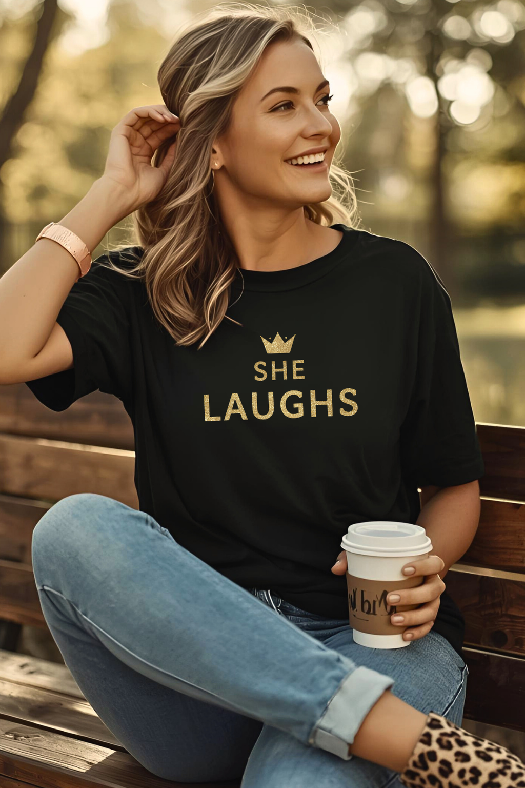 SHE LAUGHS.™ Tee – Without Fear of the Future